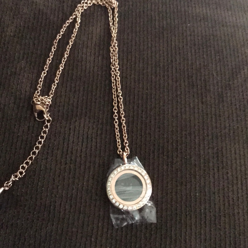 Small SHD locket. Brand New